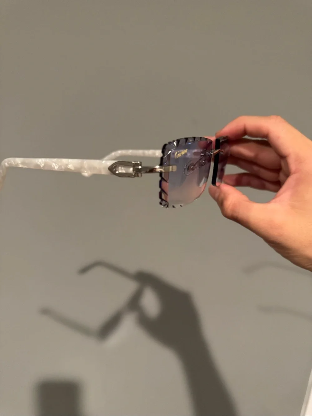 Cartier Rimless Sunglasses with White Marble Temples and Gradient Purple Lenses